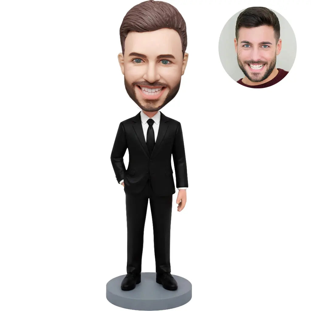 Custom bobblehead for men in all black suit with black tie one hand in pocket – personalized executive gift handcrafted from photo