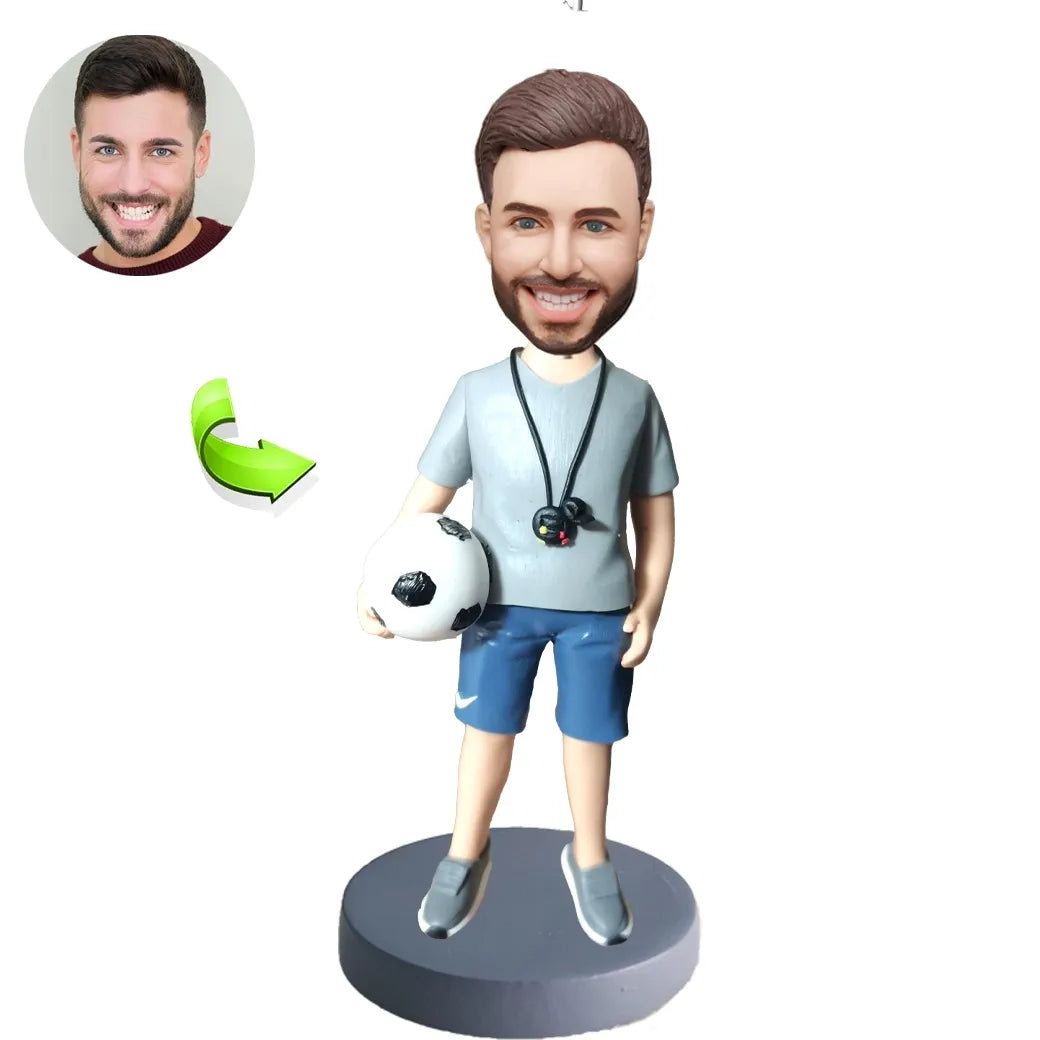 A Custom Bobblehead Doll For a Referee Holding a Football