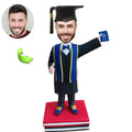 Graduation custom bobblehead of Graduation 29 in cap and gown, a memorable keepsake for graduation celebrations