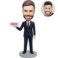 Custom bobblehead for men in navy suit with red tie holding BOSS sign – personalized boss day gift handcrafted from photo