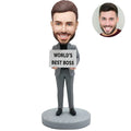 Custom bobblehead for men in gray suit holding World's Best Boss sign – personalized boss day gift handcrafted from photo