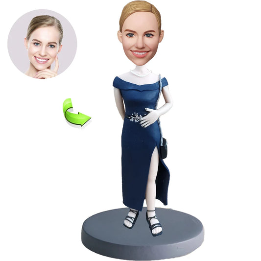 A Custom Bobblehead Doll of a Woman in  Black Dress