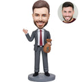 Custom bobblehead for men in gray suit holding money bag with OK gesture – personalized success boss gift handcrafted from photo