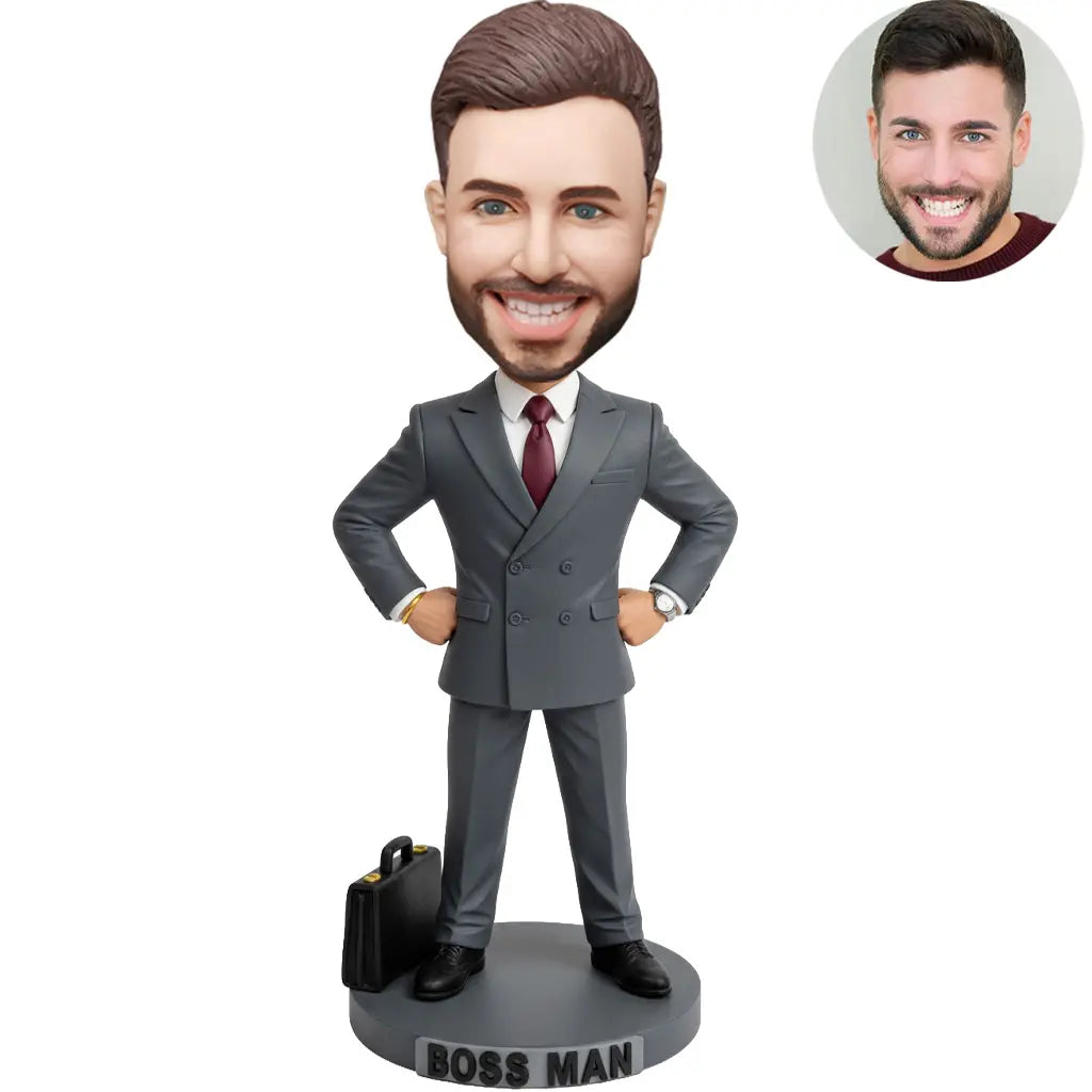 Custom Boss Man bobblehead in gray double-breasted suit hands on hips with briefcase and BOSS MAN nameplate – personalized boss day gift handcrafted from photo