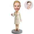 Custom Female Boss Bobblehead for Women in Cream Skirt Suit with Pearl Necklace Holding Mug – Personalized Boss Day Gift for Her