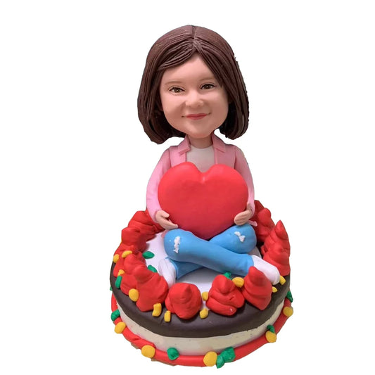 The Girl Sitting on The Cake Made a Custom Bobblehead