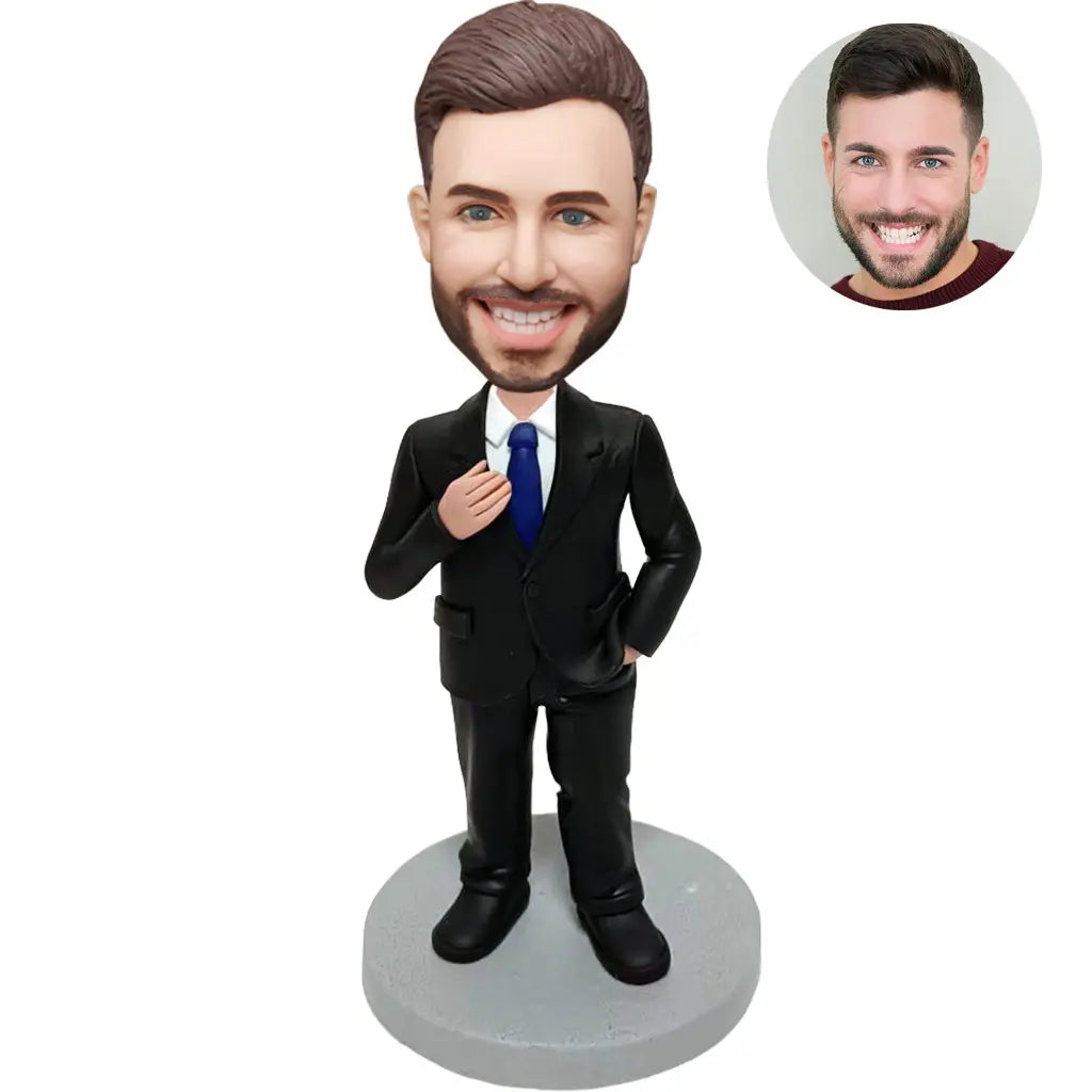 Custom bobblehead for men in black suit with blue tie adjusting tie – personalized boss gift handcrafted from photo