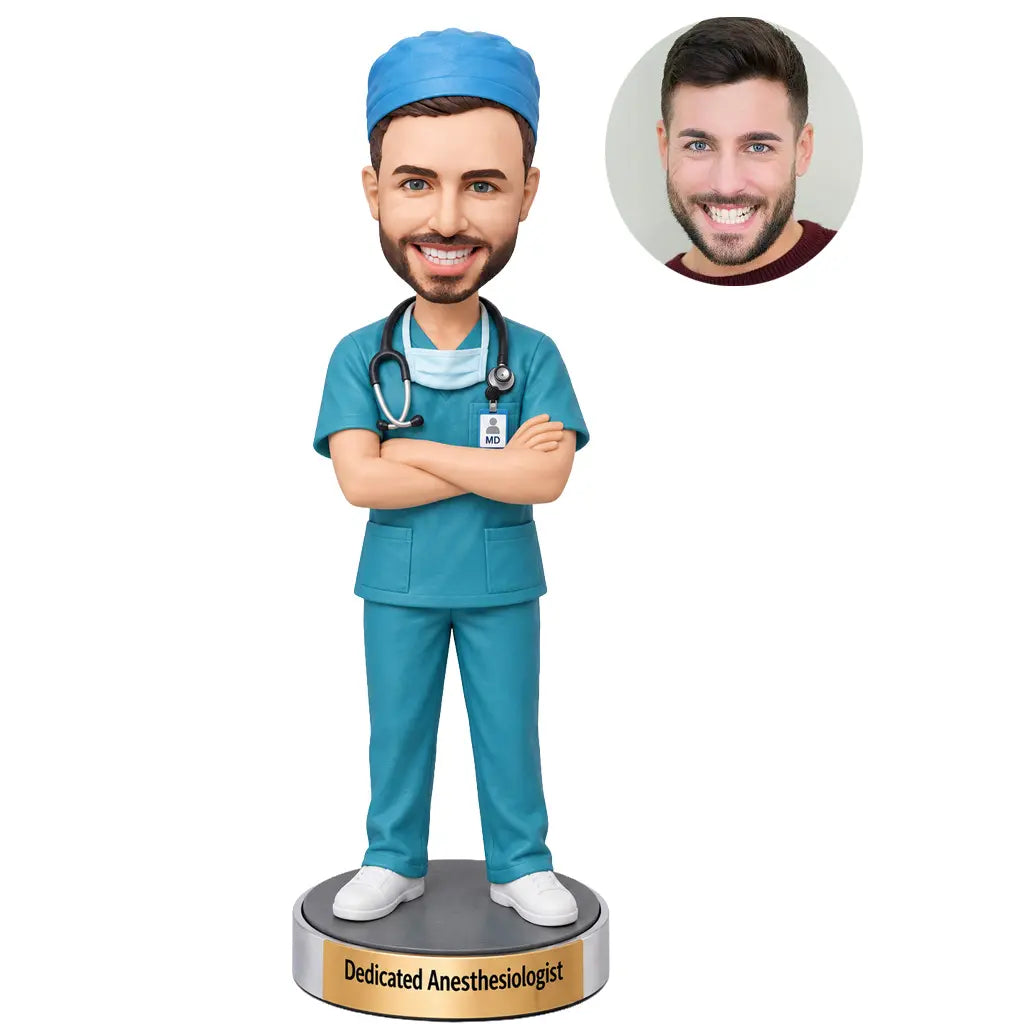 Custom anesthesiologist bobblehead in teal surgical scrubs with cap, stethoscope and personalized base