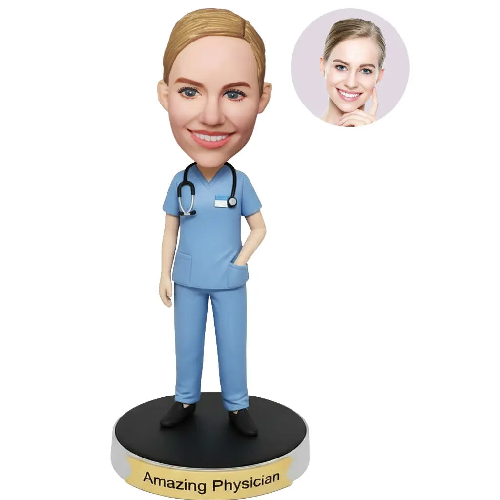 Custom female doctor bobblehead from photo wearing light blue medical scrubs with stethoscope and ID badge