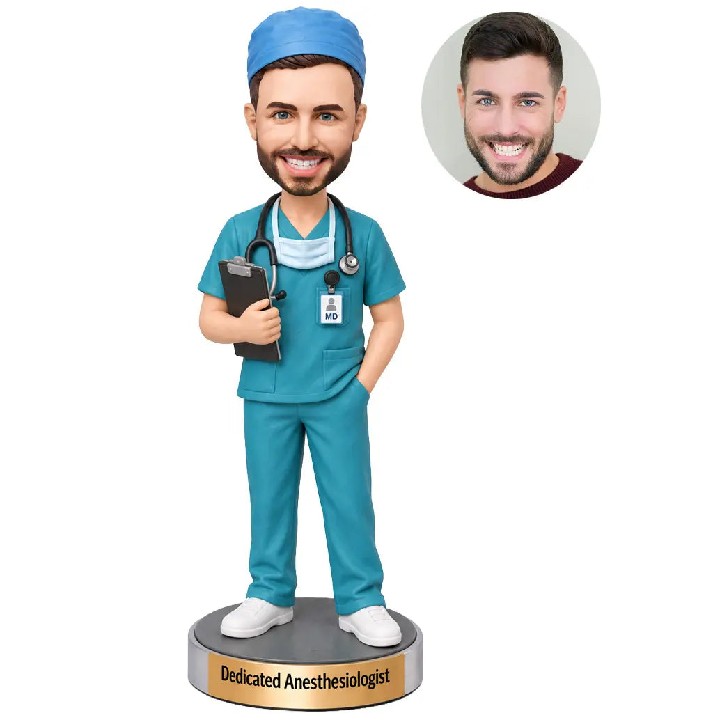Personalized anesthesiologist bobblehead in teal medical scrubs holding a clipboard with surgical cap and stethoscope