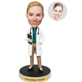 Personalized female doctor bobblehead from photo wearing a white coat with stethoscope and medical chart
