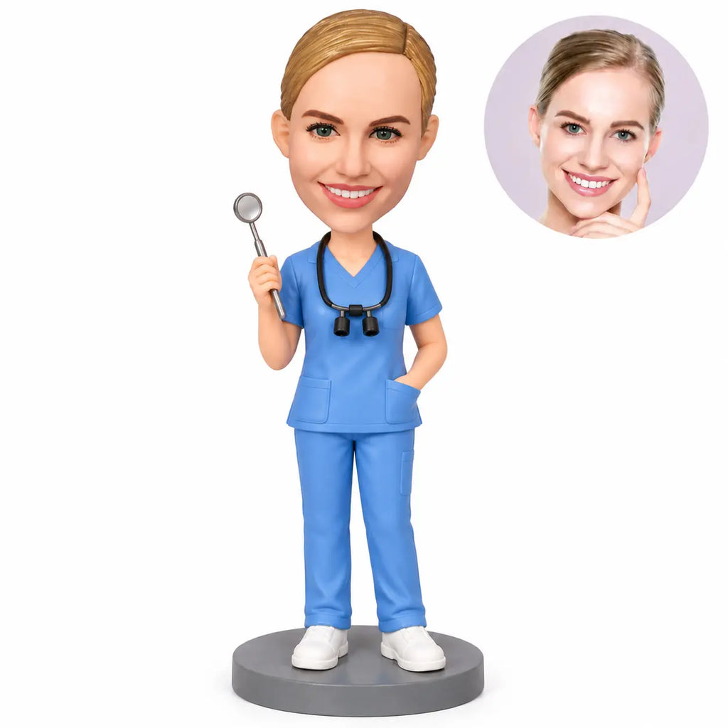 Custom female dental hygienist bobblehead in blue scrubs holding a dental mirror