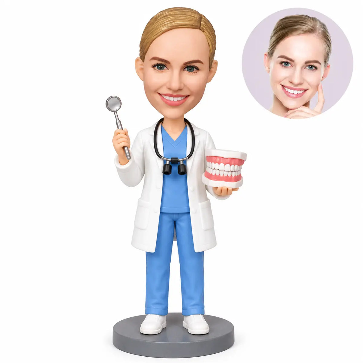Custom female orthodontist bobblehead in blue scrubs holding a dental mirror and braces model