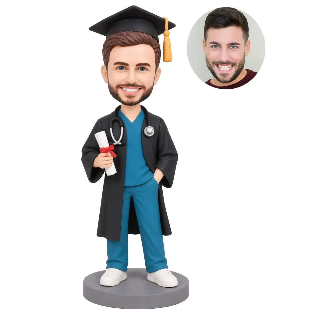 Custom male nurse graduation bobblehead in black graduation gown over teal scrubs with cap and diploma